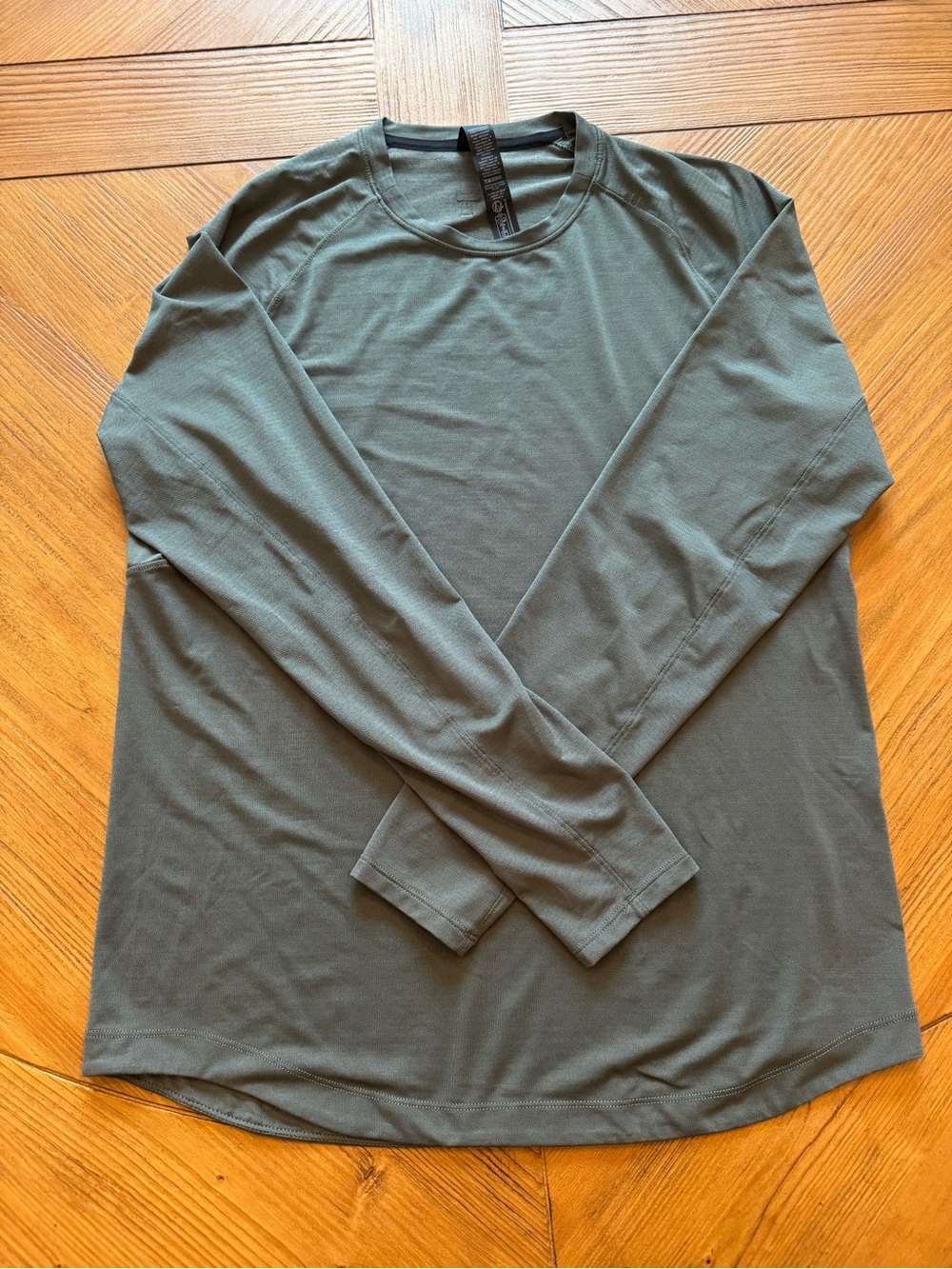 LIKE NEW LULULEMON LICENSE TO TRAIN LONG SLEEVE SHIRT DARK FOREST GREEN